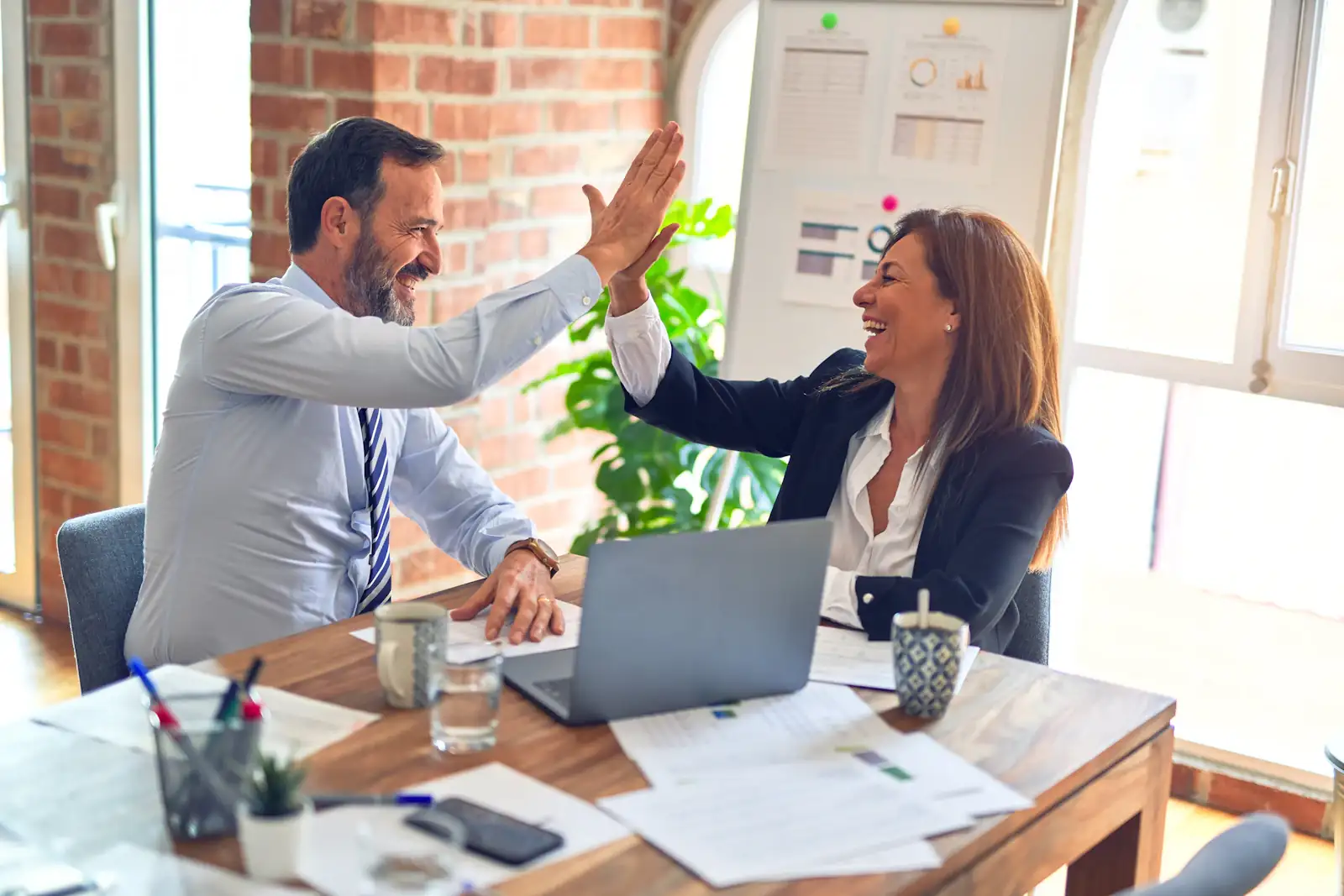 Rixsols partners celebrating successful AI and software delivery outcomes