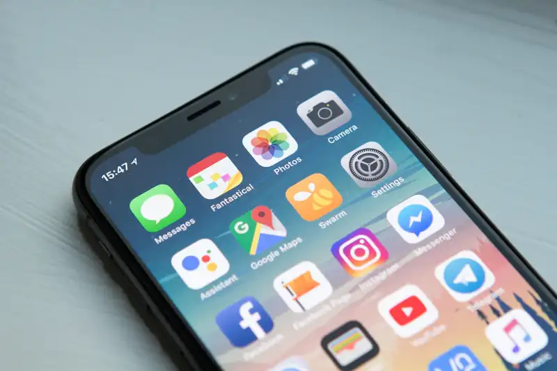 Mobile app design prototypes on a smartphone screen