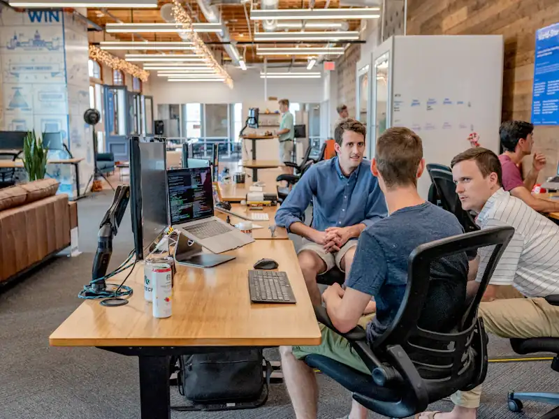 Sales team reviewing CRM pipeline data in a business meeting